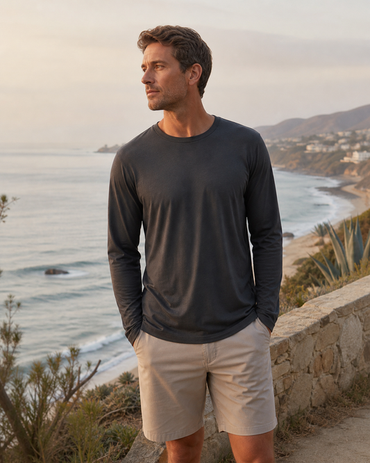 Charcoal lightweight TENCEL long sleeve tee at a coastal overlook